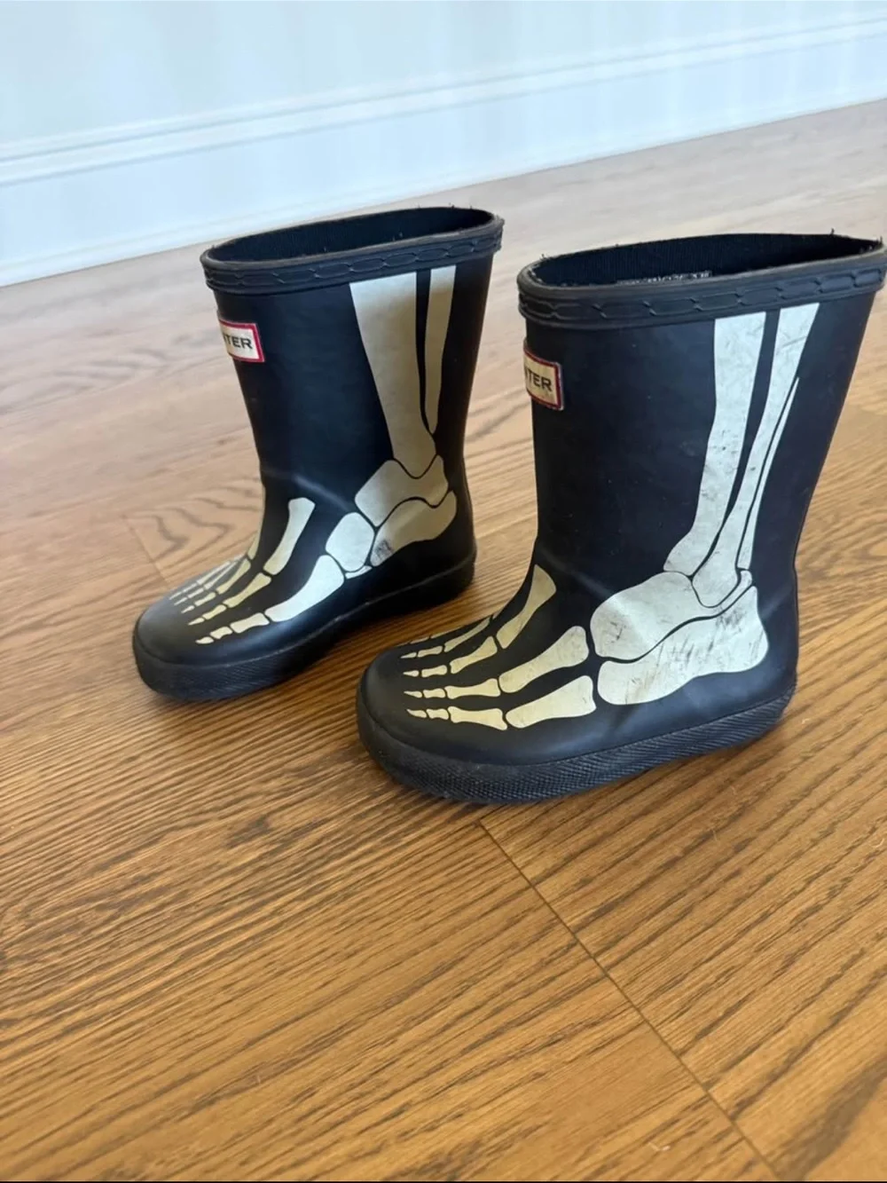 Hunter Kids Black Rain Boots with Skeleton Foot Print